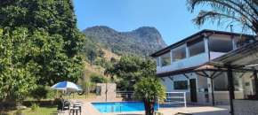 Pousada Cantinho do Sossego Paraty tem Piscina com Vista pra Montanha, Salão de Jogos, Café da Manhã, Estacionamento, Gerador de Energia, Próximo as principais Praias, Ilhas e Cachoeiras